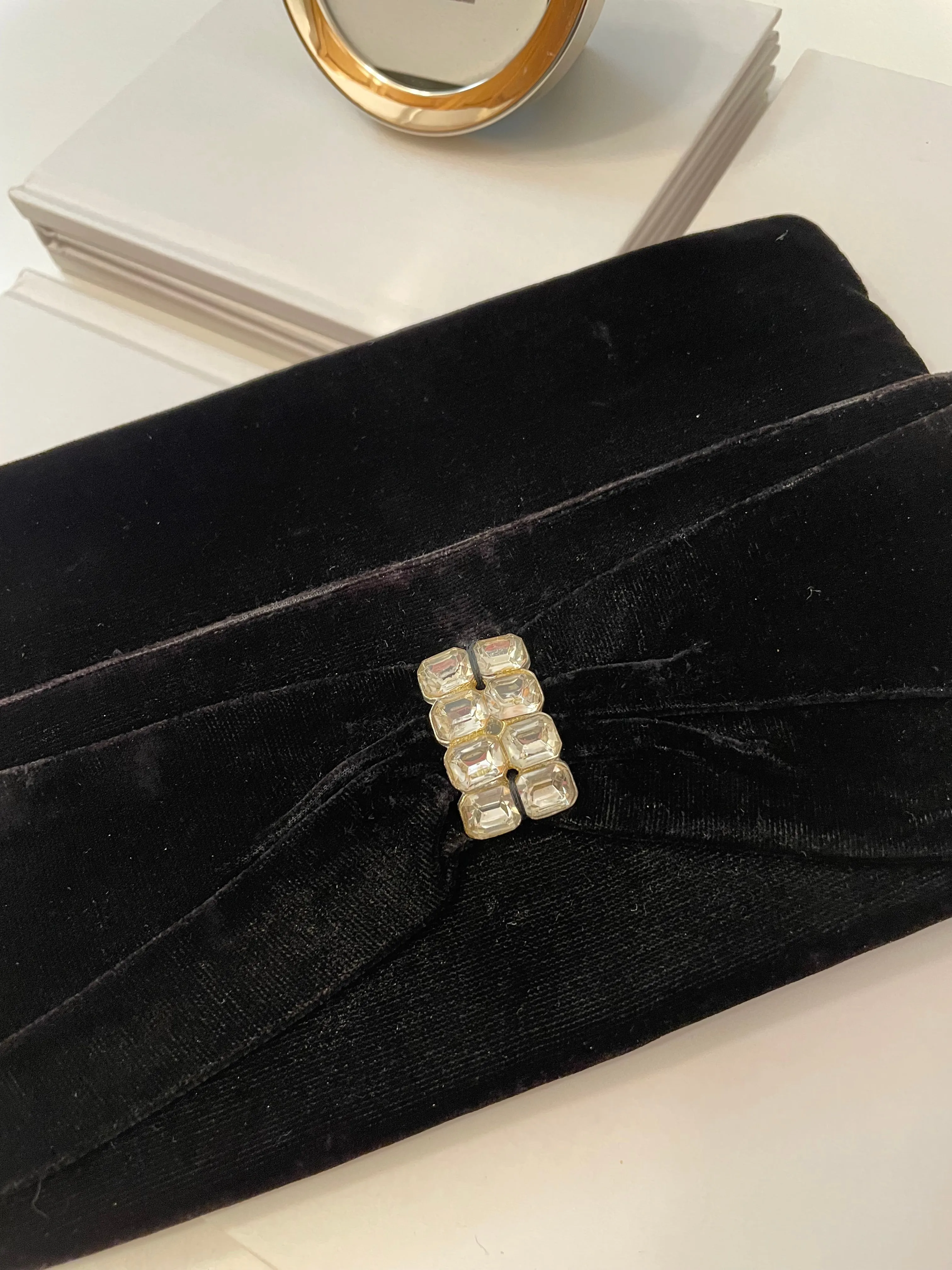 The Socialite and her love of a gem studded velvet clutch bag... 1950's chic